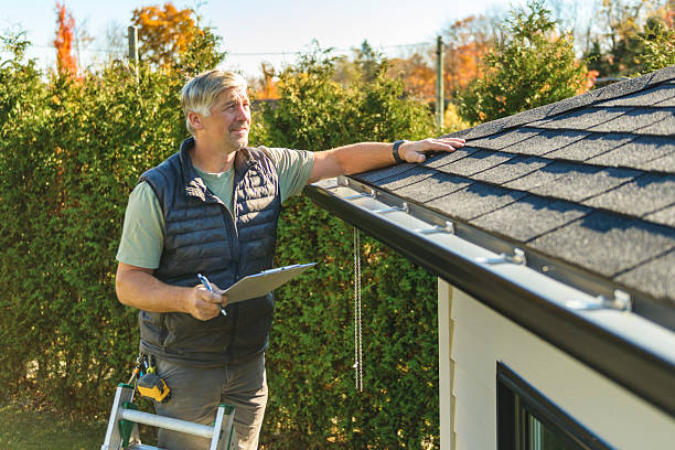 Professional Storm Damage Roof Repair technician working in Lindstrom, MN
